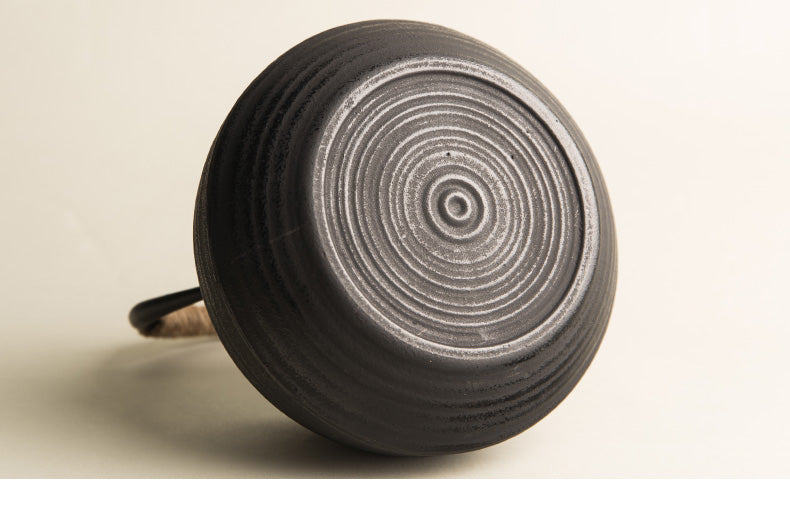 Cast Iron Tea Kettle with Spiral Pattern Design