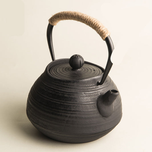 Cast Iron Tea Kettle with Spiral Pattern Design